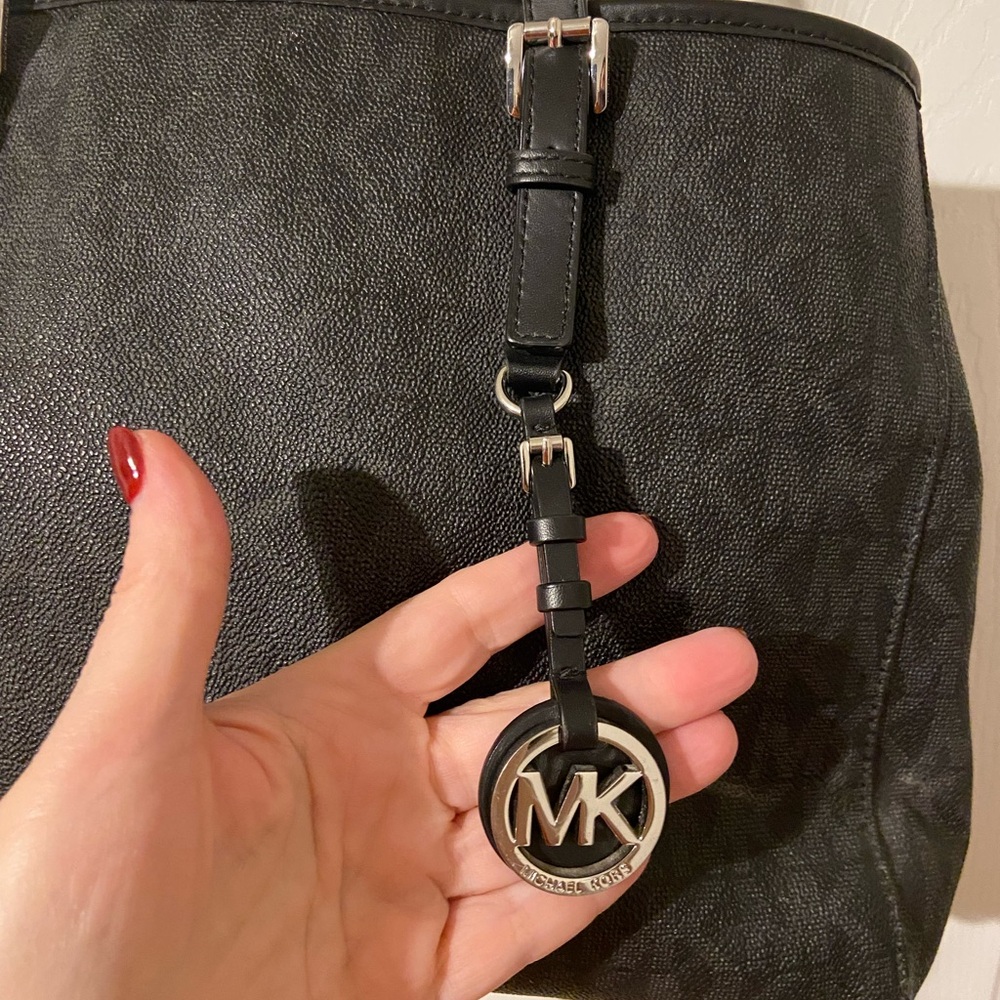 Michael Kors Black Monogram Tote
Preloved condition - Picture 2 of 12